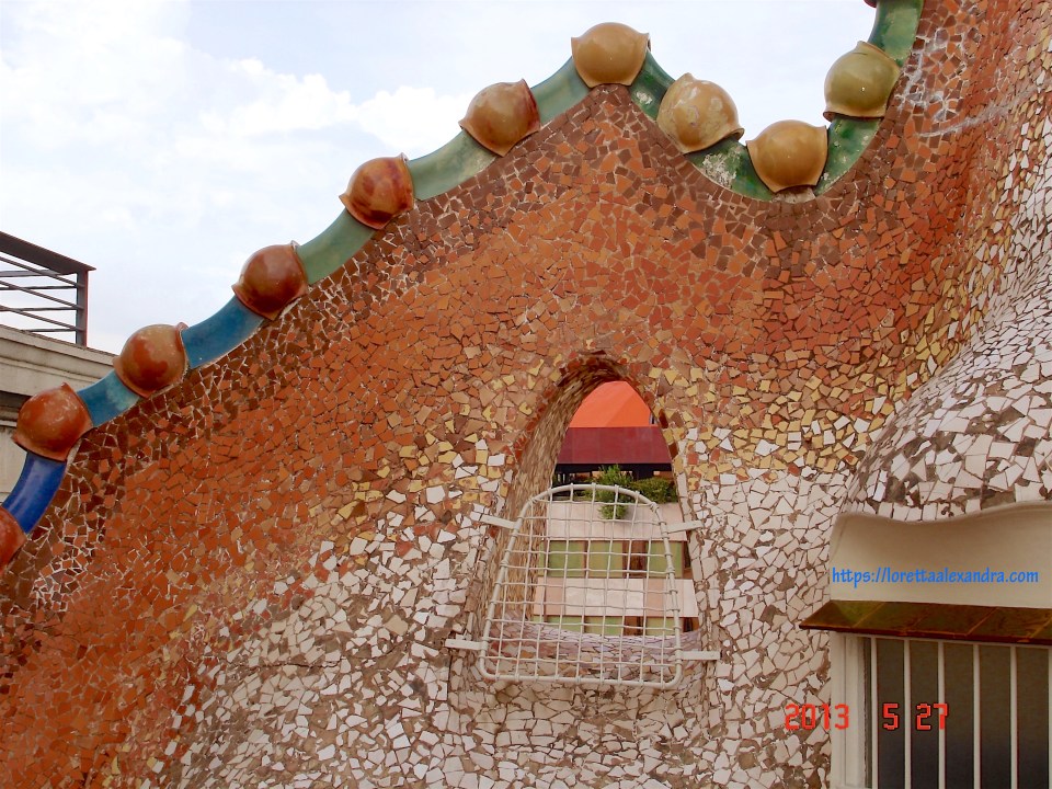 The roof terrace at Casa Batlló - Detail of the mosaic façade, referred to as the “dragon's back”.