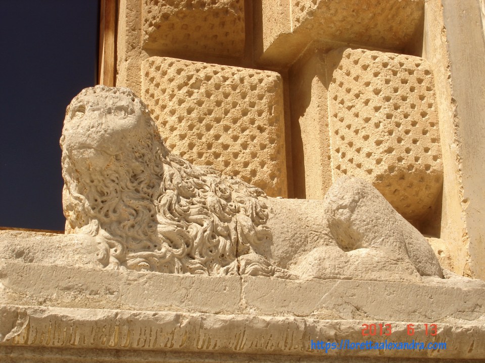 At the southern entrance to the Palace of Charles V.