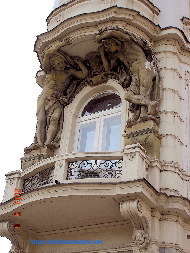 Façade detail of a building on fashionable Pariska Street, in Prague