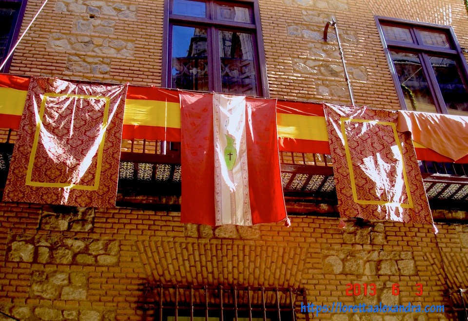 Banners and tapestries are hung in celebration of the Feast of Corpus Christi