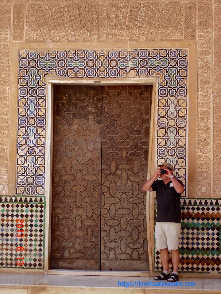 Moorish tiles framing an entrance to the Nasrid Palaces.