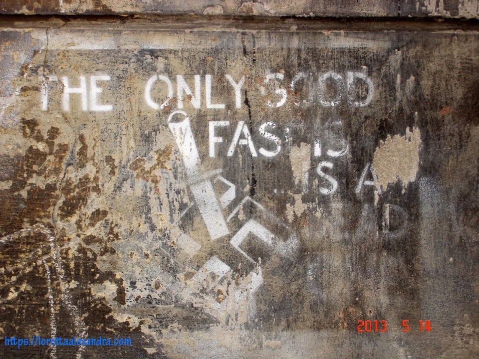 On a building wall in the Kazimierz District, Kraków, Poland