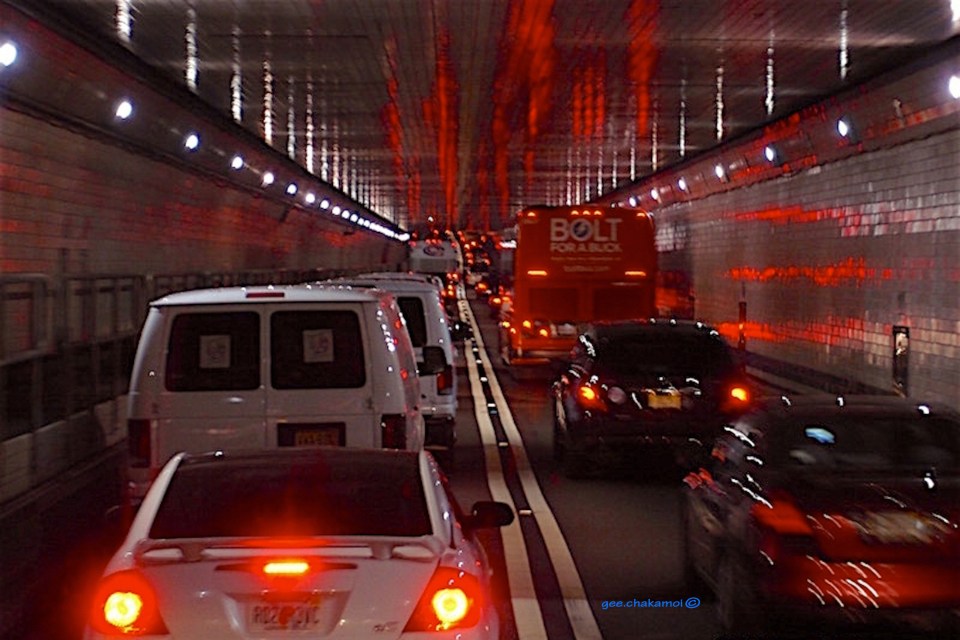 Early morning, through the Lincoln Tunnel, heading for Manhattan